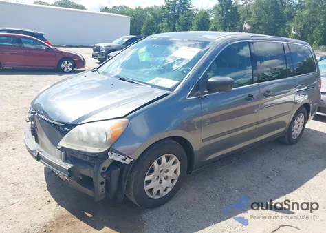2010 Honda Odyssey Lx z USA, uszkodzony, nr VIN 5FNRL3H21AB059843
